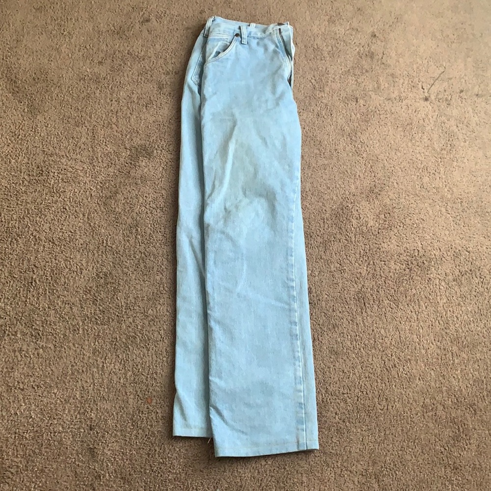 Light wash Wrangler blue jeans